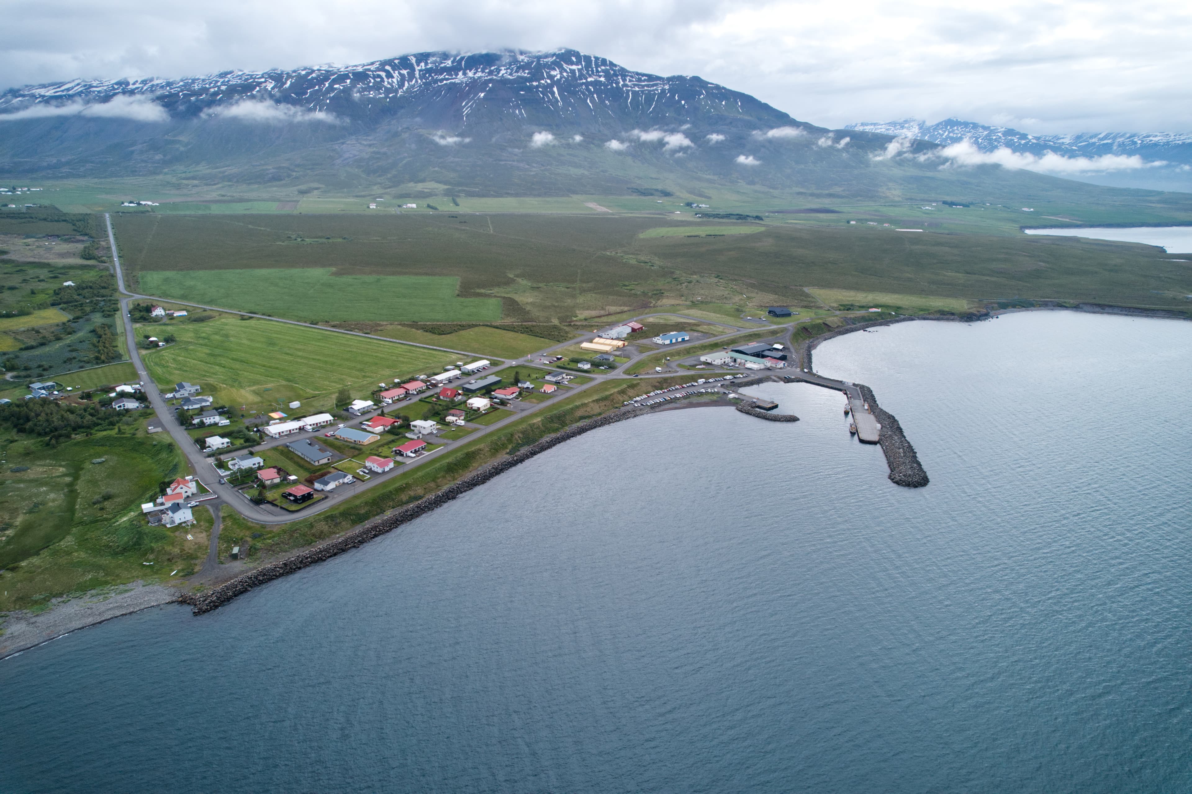 Aerial view of the village of Árskógssandur beside the sea in North Iceland